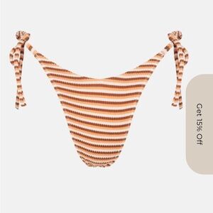 Rhythm bikini bottom. Never worn, hygienic liner still on